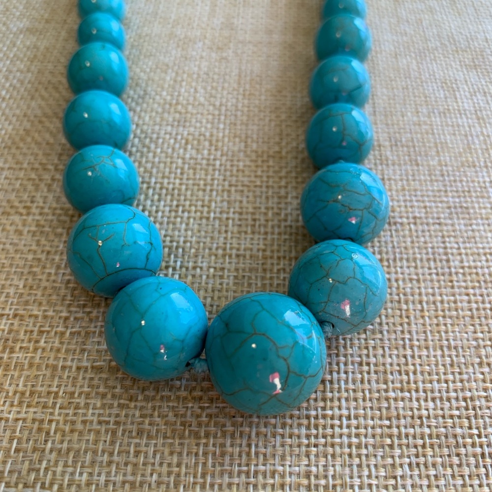 Graduated Turquoise Color Howelite Knotted Stone Beaded Necklace